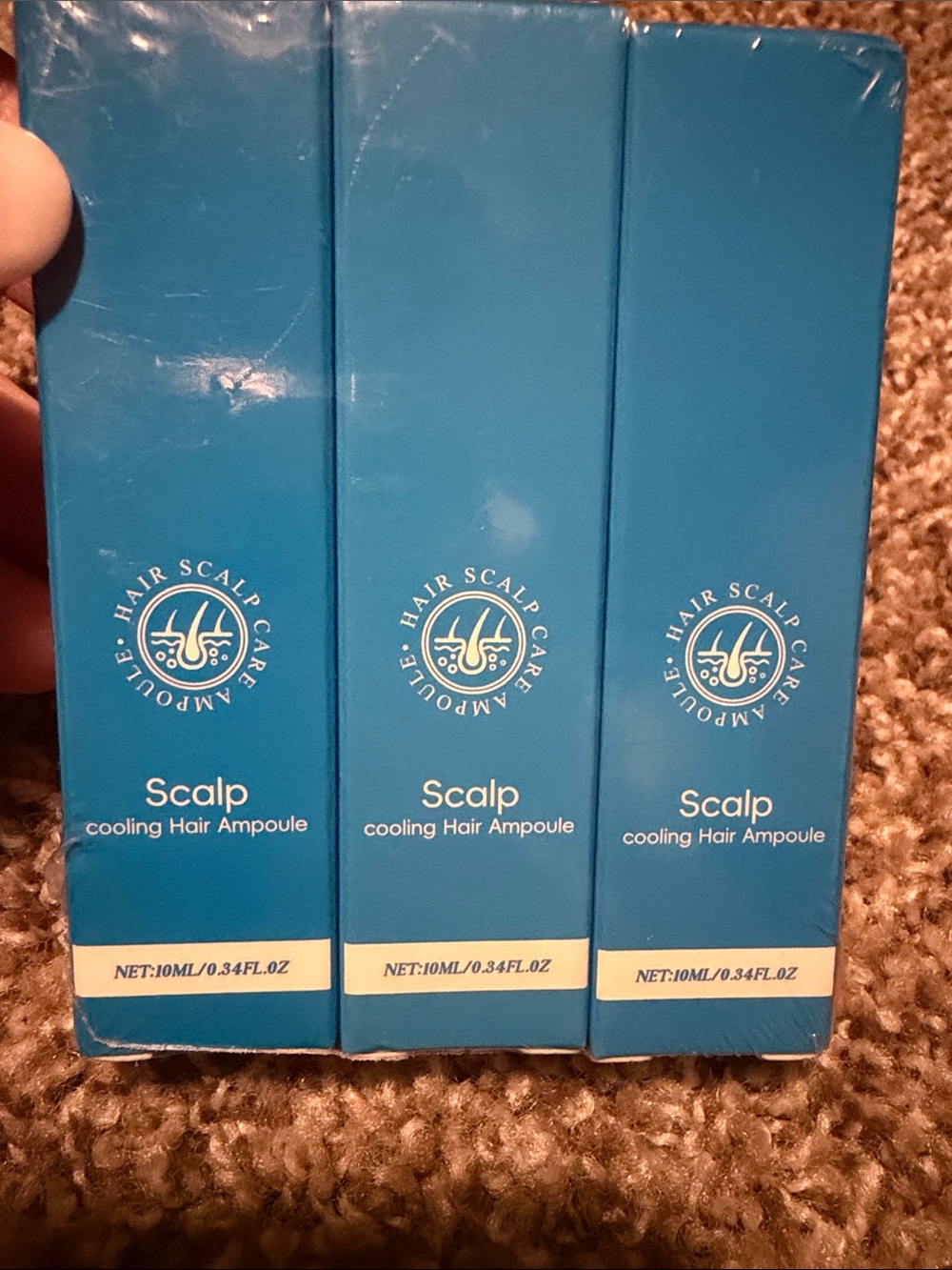 3-pack of new-in-package Aparthy Hair Growth Roll-on Serum